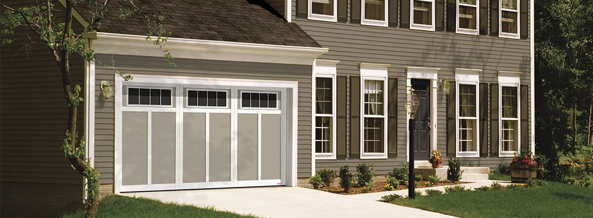 Eastman E-12, 14’ x 7’,  Claystone door and Ice White overlays, 4 vertical lite Orion windows